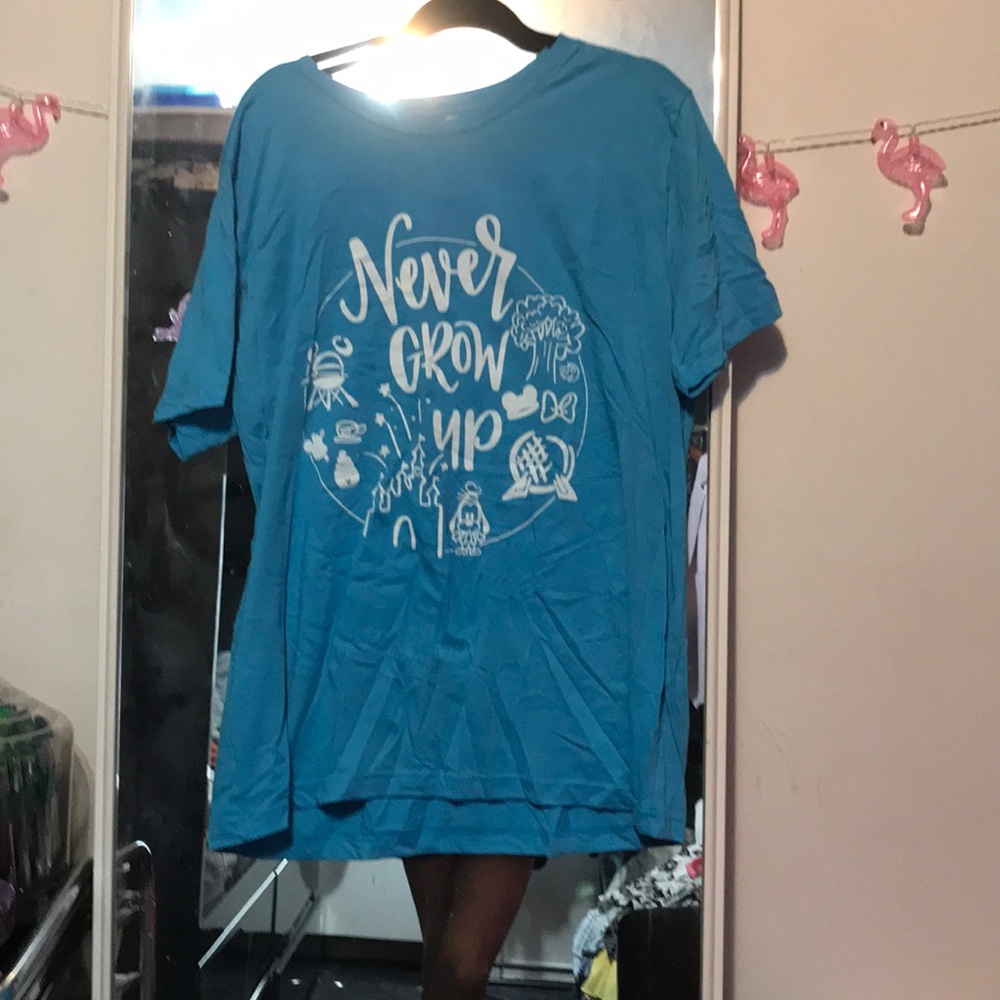 Blue never worn “never grow up” Disney tee shirt
